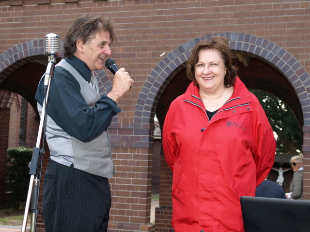 Compere Pat introduces ACU Associate Vice Chancellor, Marea Nicholson and invites her to welcome the punters.