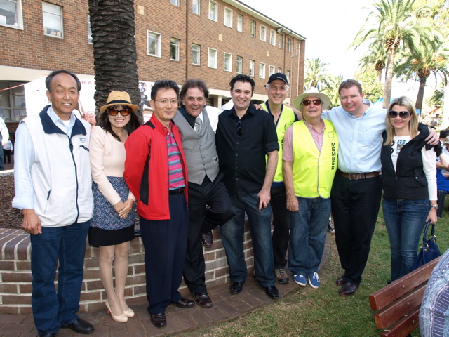 Pat and 'the Pollies' line up with the Rotary folk to say goodbye... until next time!